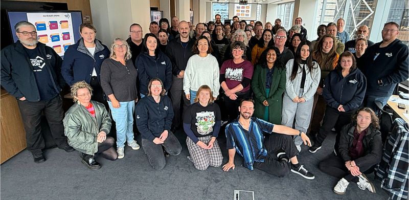 Australian Services Union — Victorian & Tasmanian Branch team. JJ Argent seated front-centre wearing a blue-and-black striped shirt.